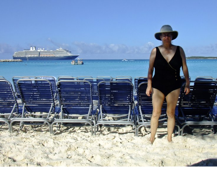 009_DSCF0711b.jpg - The natural look of clear water, white sand and blue beach chairs