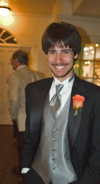 Hi, I'm Jon.  Welcome to the wedding.  Do you like my teeth?